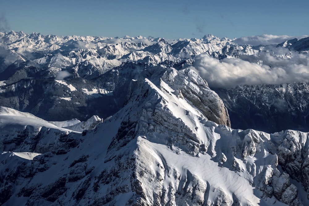 snow covered mountain during daytime