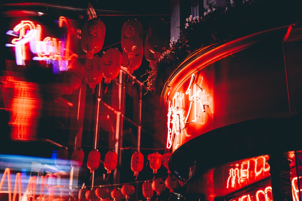red chinese lanterns on street during night time