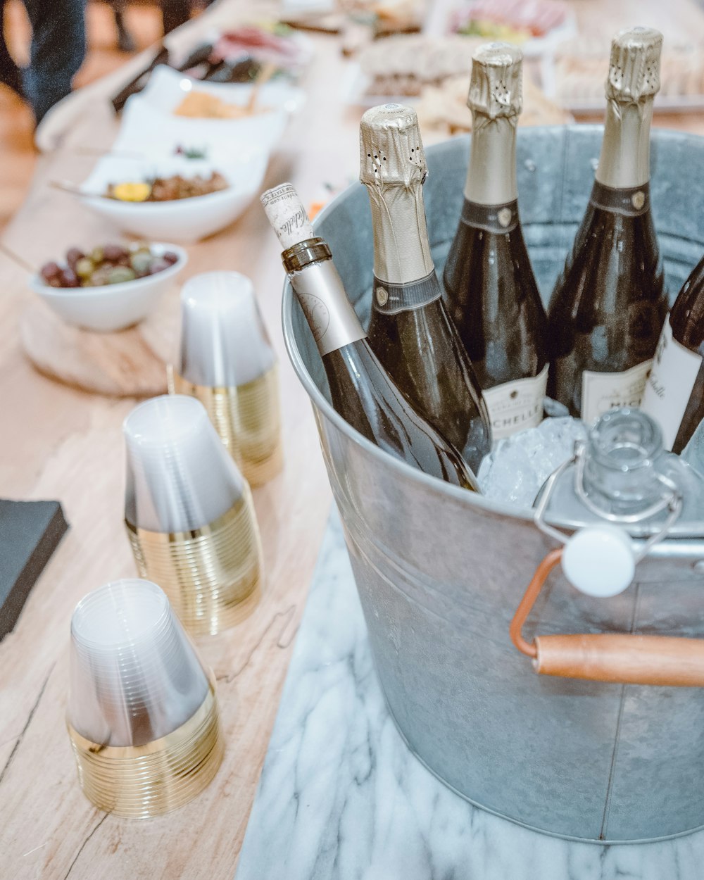 stainless steel bucket with bottles