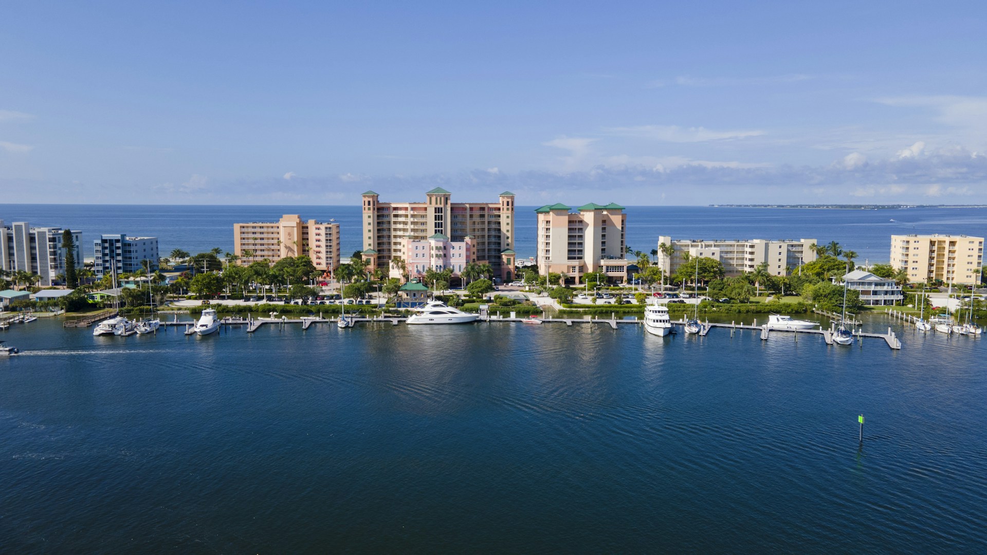 city skyline across body of water during daytime