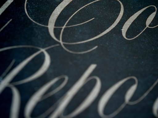 An elegant contact form design with a black, white, and gold theme.