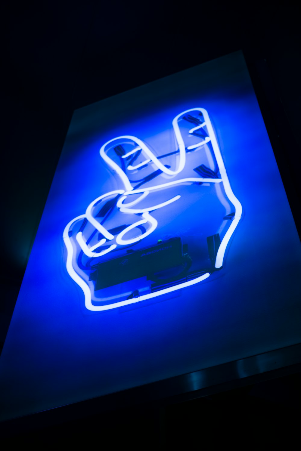 blue and white neon light signage