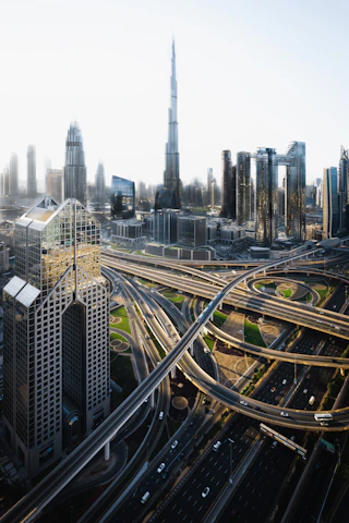 A futuristic cityscape with electric vehicles and smart data overlays illustrating real-time analytics in urban mobility.