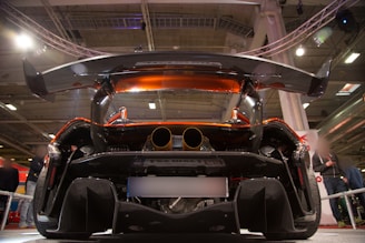 black and red car in a room
