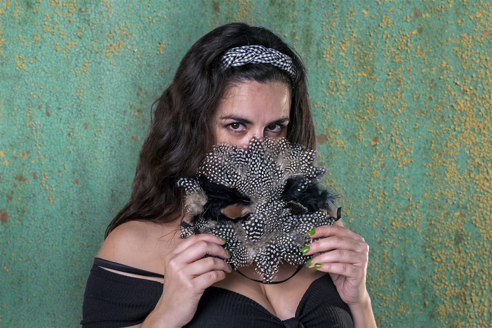 woman in black and white leopard print brassiere