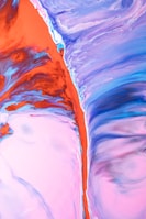An abstract photo featuring vibrant colors blending in motion.