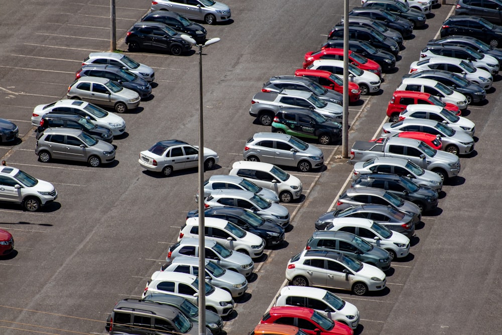 cars parked on parking lot during daytime