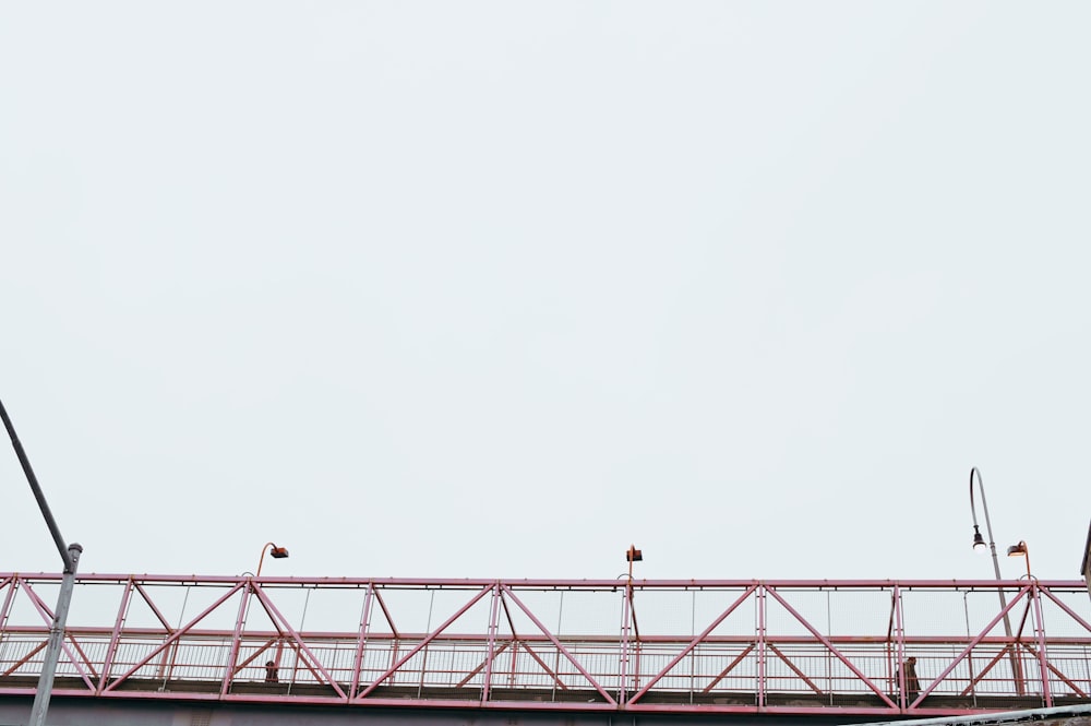 person standing on the bridge