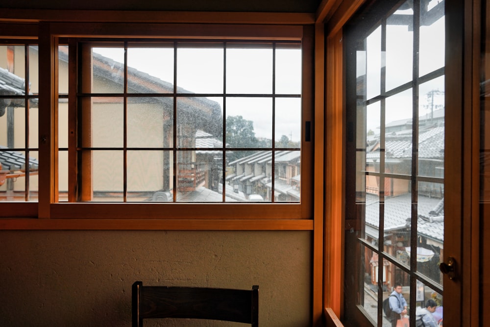 brown wooden framed glass window