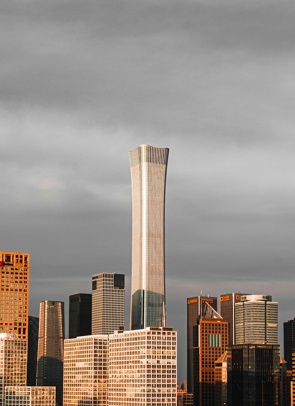 city skyline under gray sky during daytime