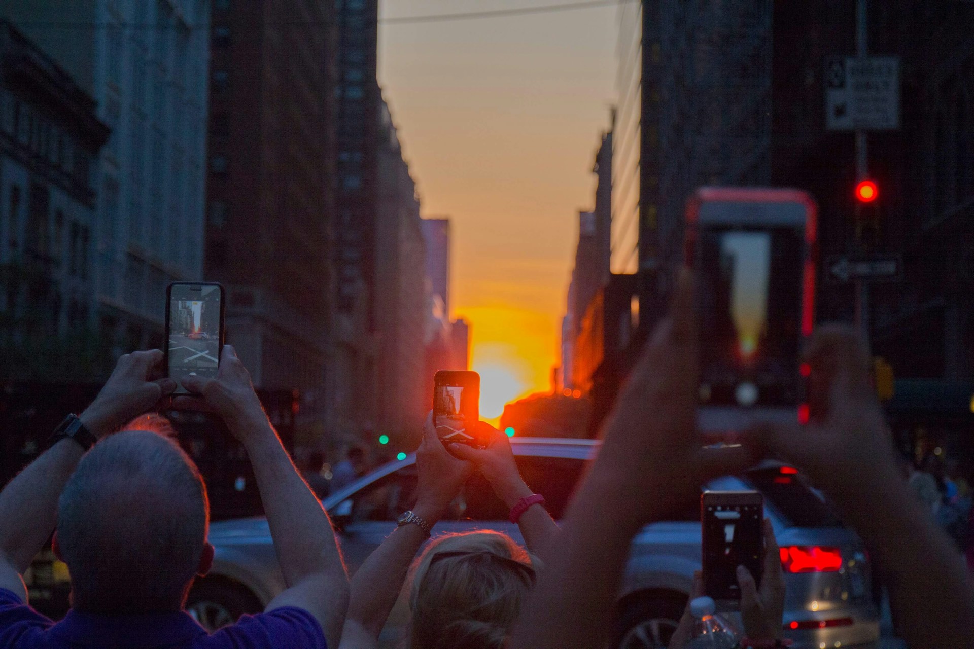 woman wearing yellow long-sleeved dress under white clouds and blue sky during daytime