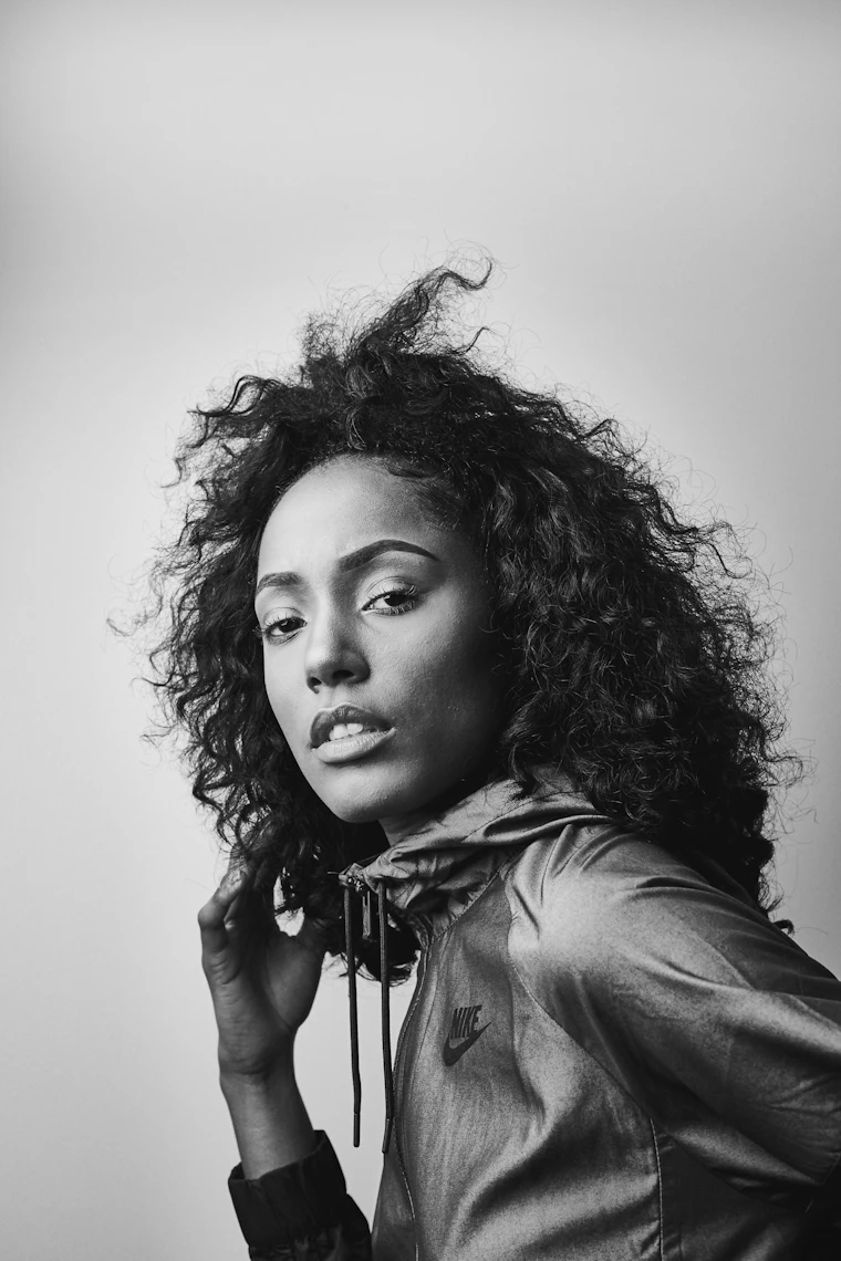 Grayscale portrait in black leather jacket