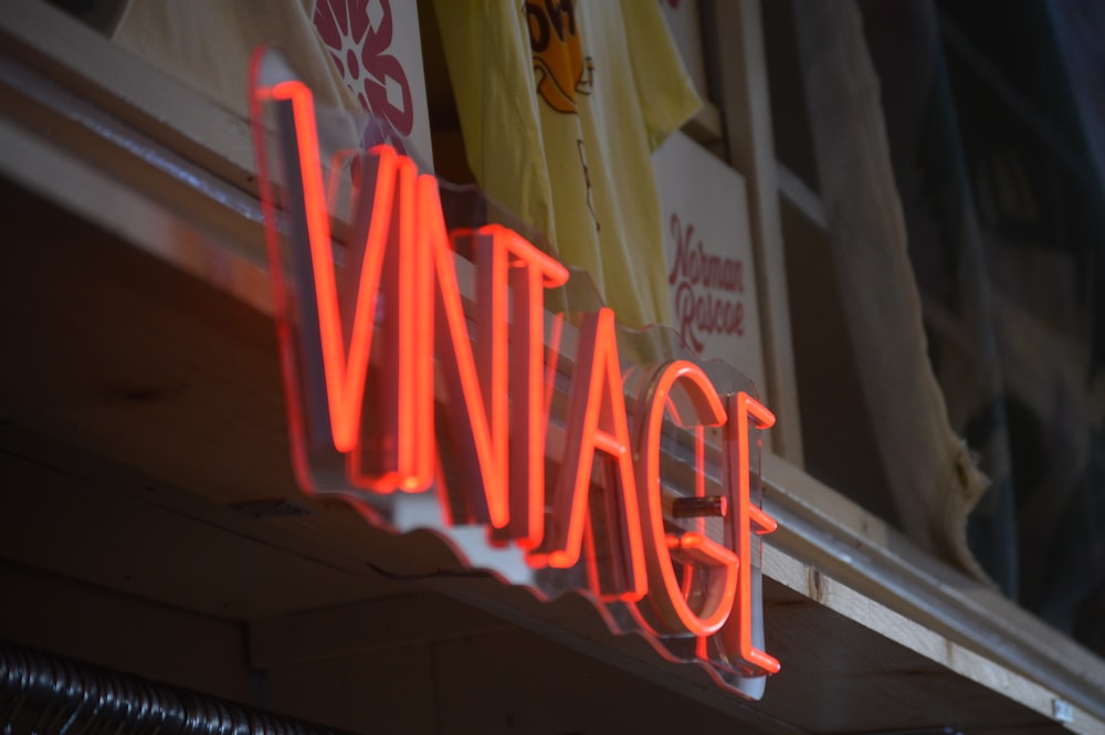 red and white love me neon light signage