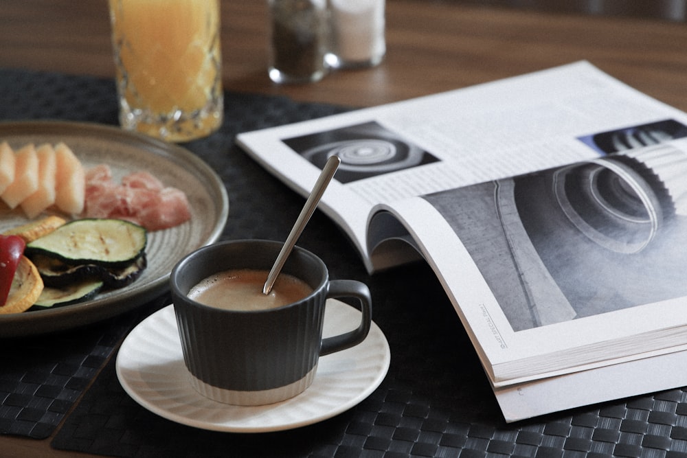 white ceramic mug with brown liquid inside