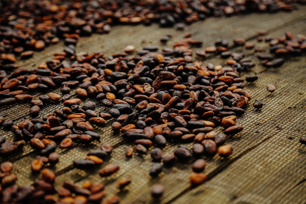 brown coffee beans on brown wooden table