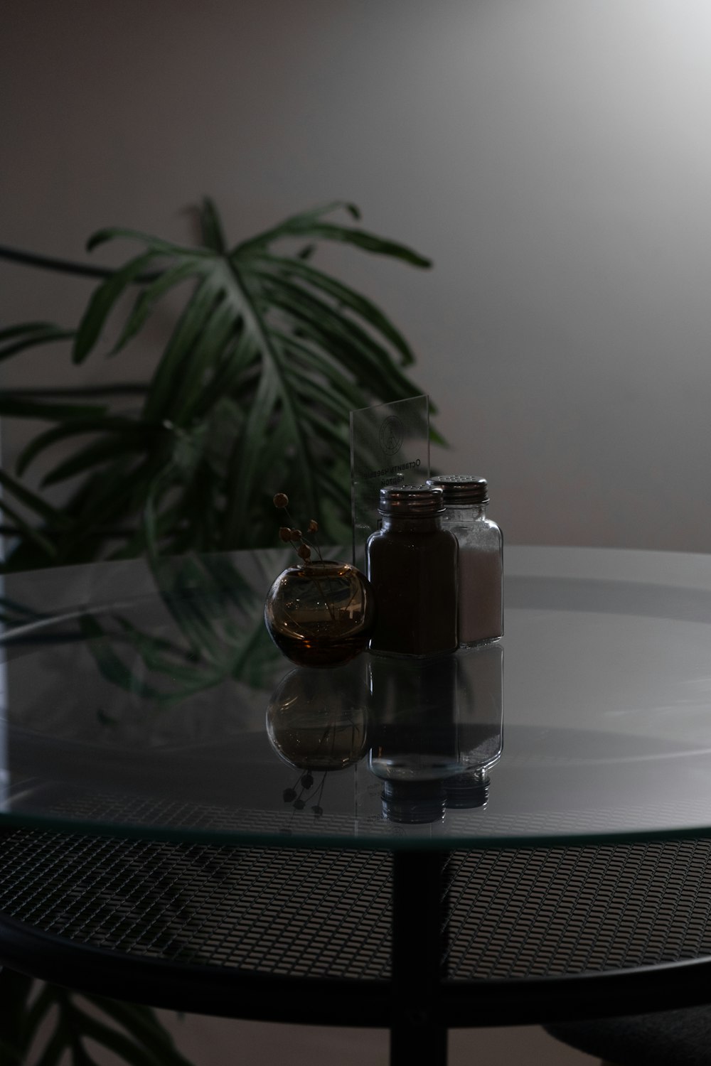 clear glass jar with brown liquid inside