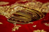 gold and red floral textile