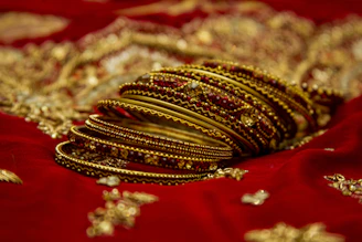 gold and red floral textile