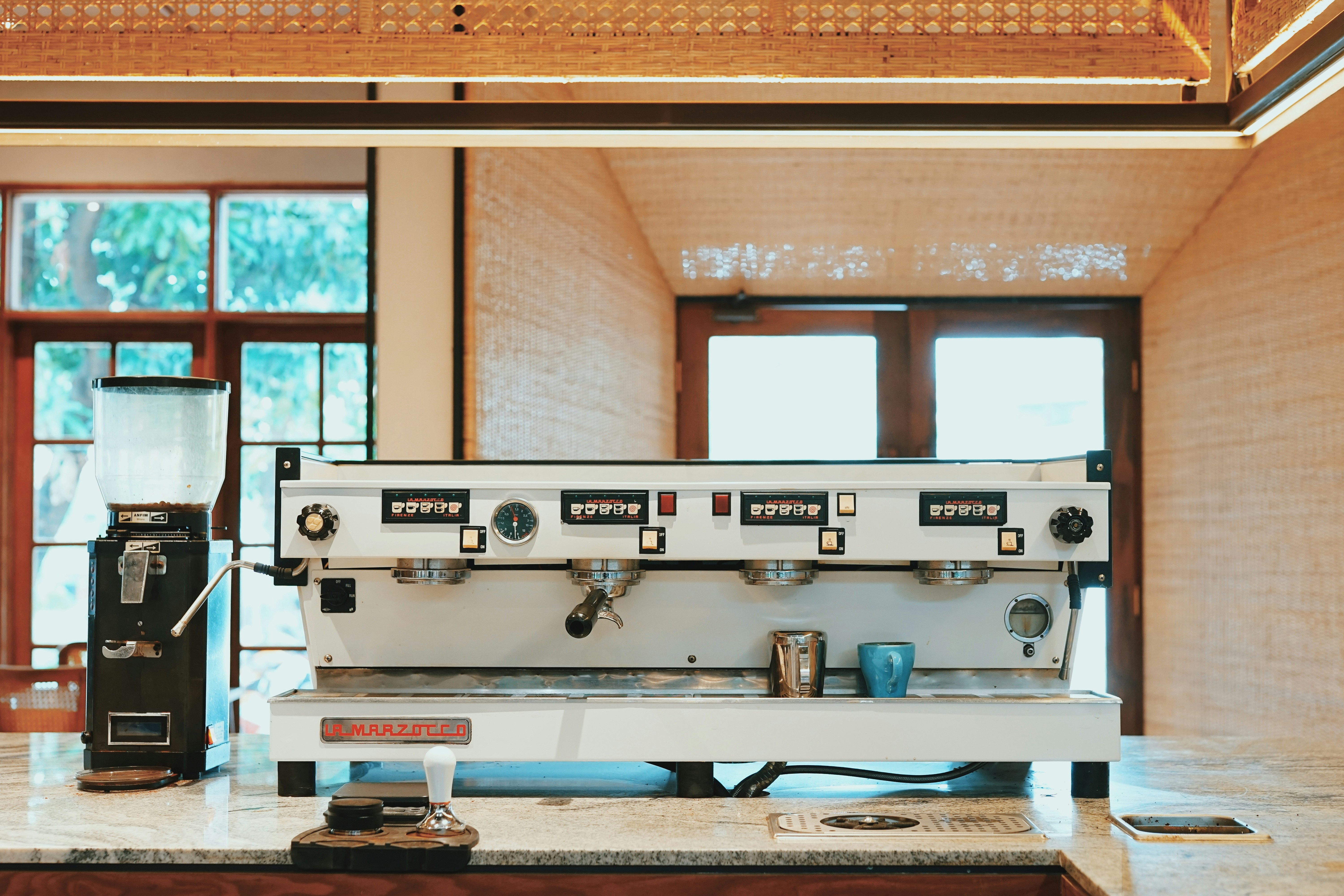 Professional coffee maker in workspace