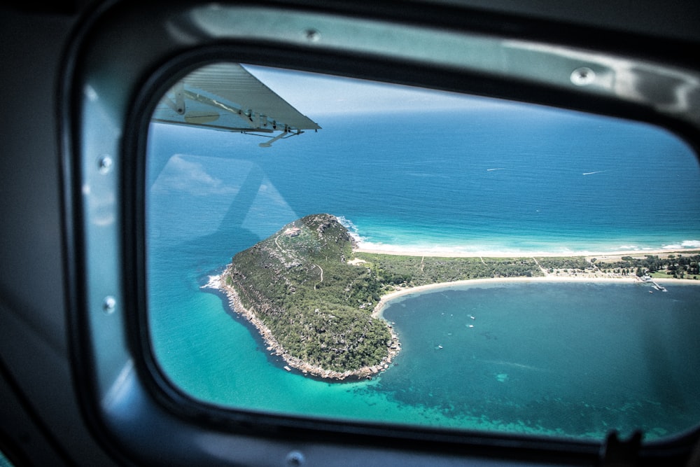 aerial view of island in the middle of the sea