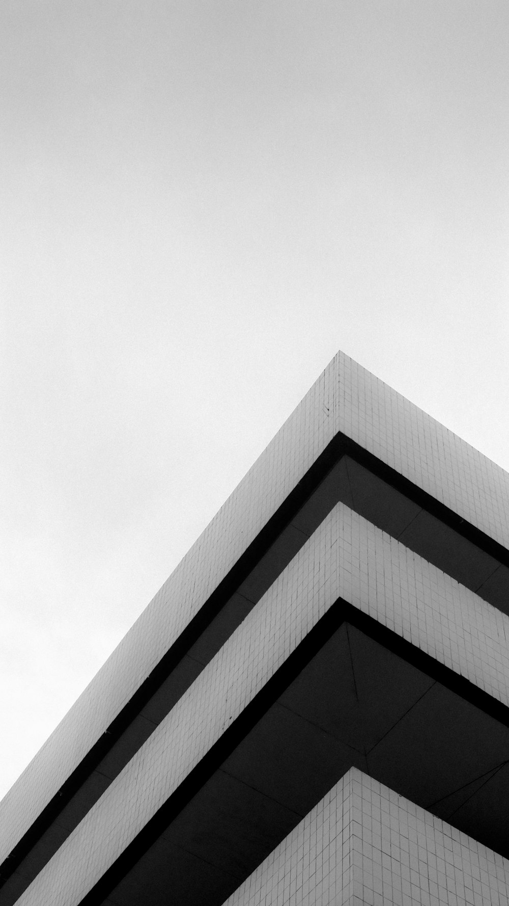 grayscale photo of concrete building