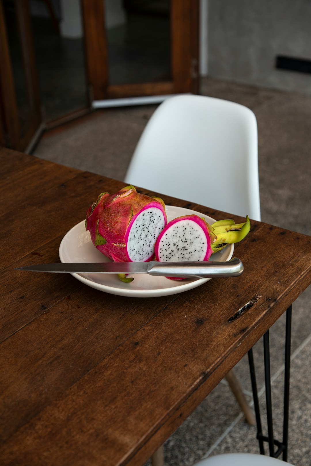 red and white ice cream on white ceramic plate