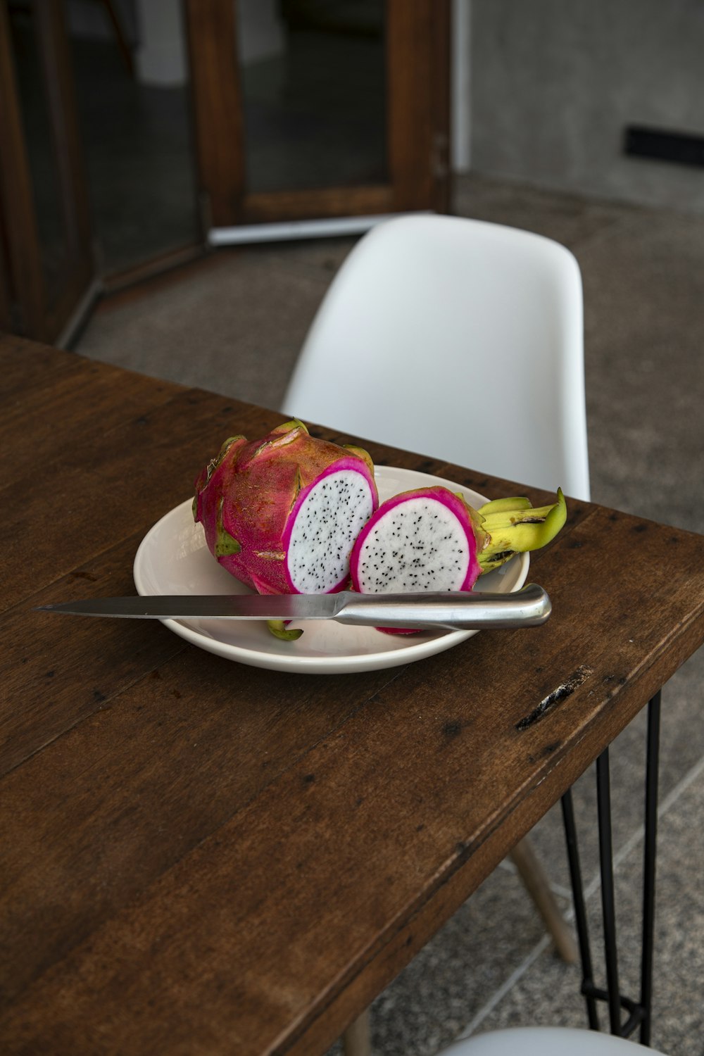 red and white ice cream on white ceramic plate