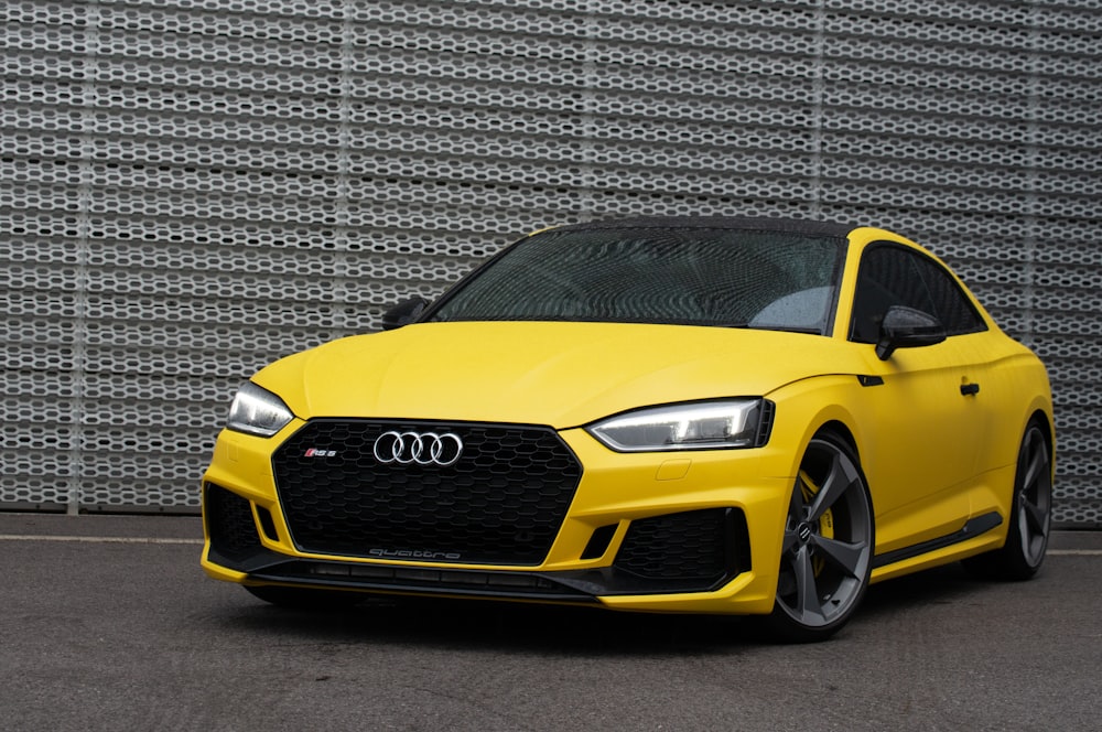 yellow mercedes benz c class coupe