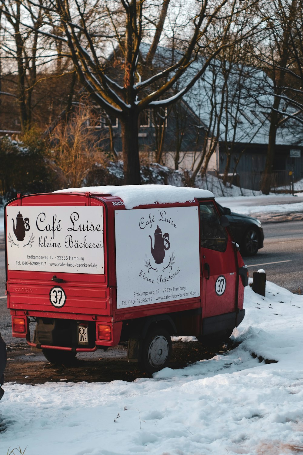 red and white volkswagen t-2 van on road during daytime