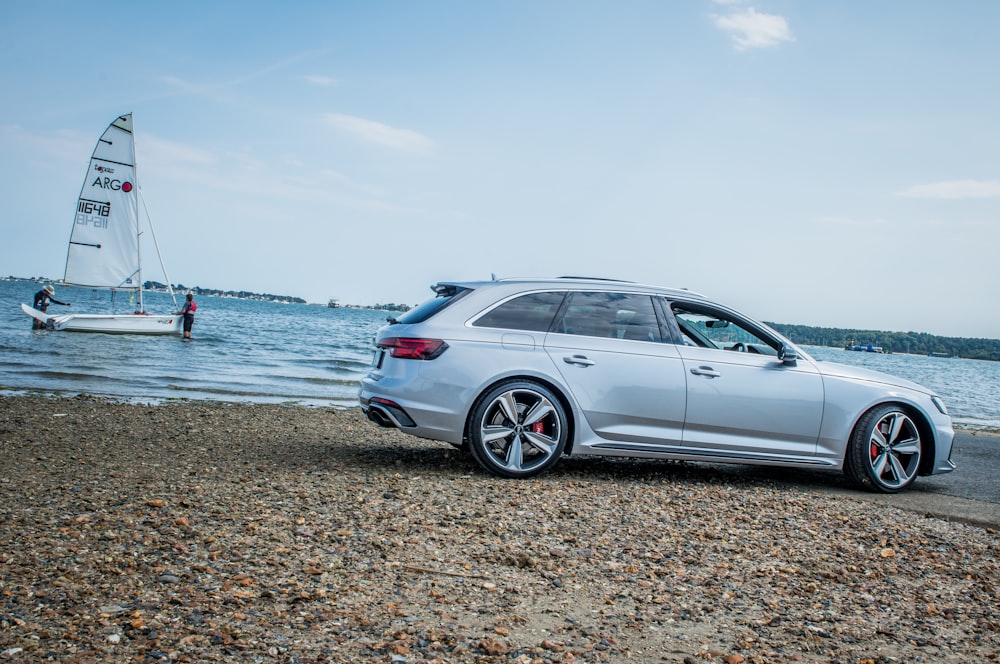 silver suv on beach during daytime