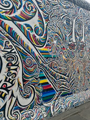 A vibrant mural painting showcasing colorful designs.