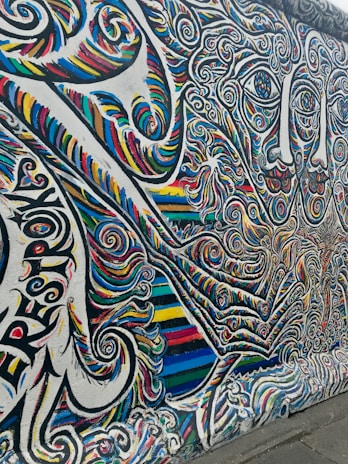 A vibrant close-up of a colorful street mural with intricate details.