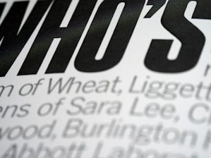 A sleek black background with white Poppins font text displayed clearly.