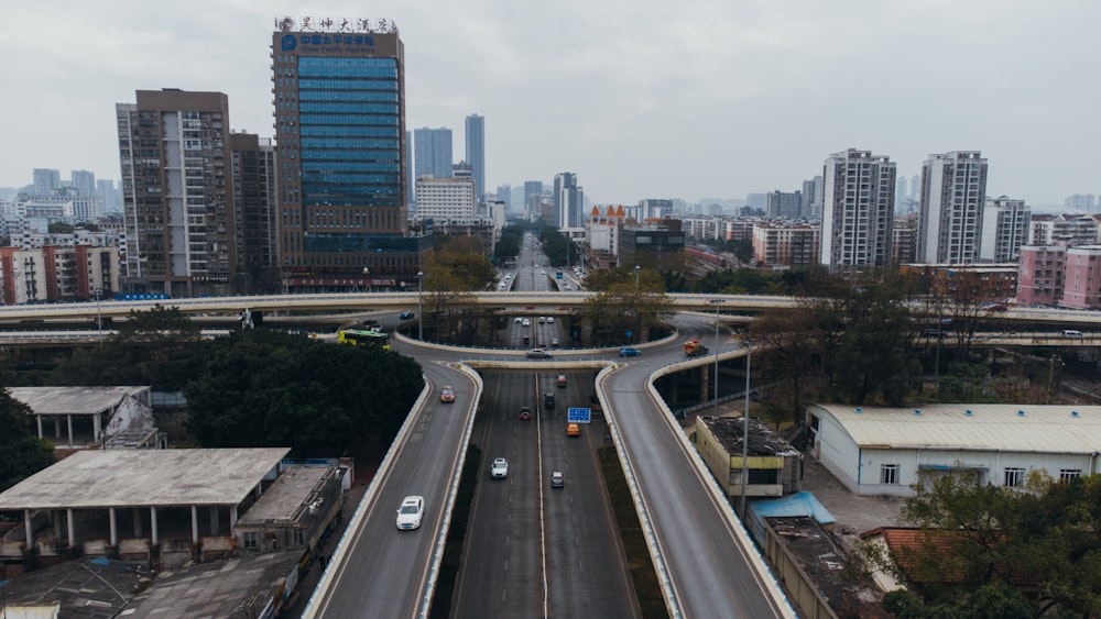 city buildings and road during daytime