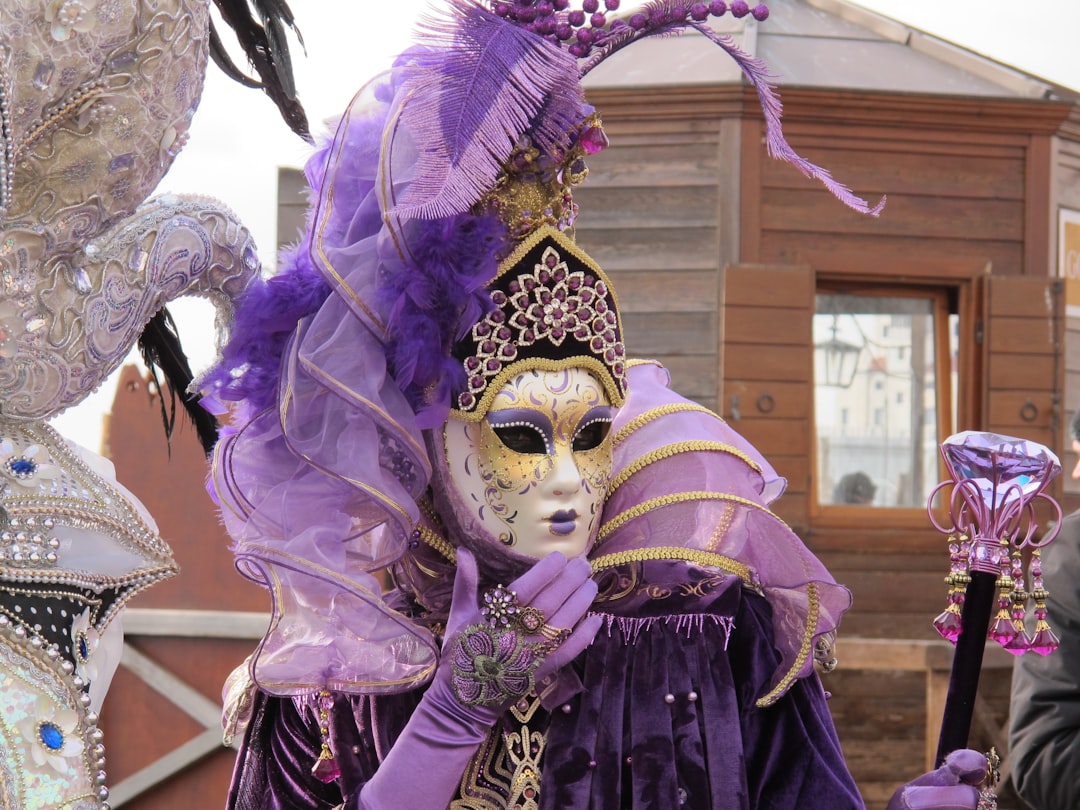 person wearing gold and purple mask, An Old carnival moment in Venice.