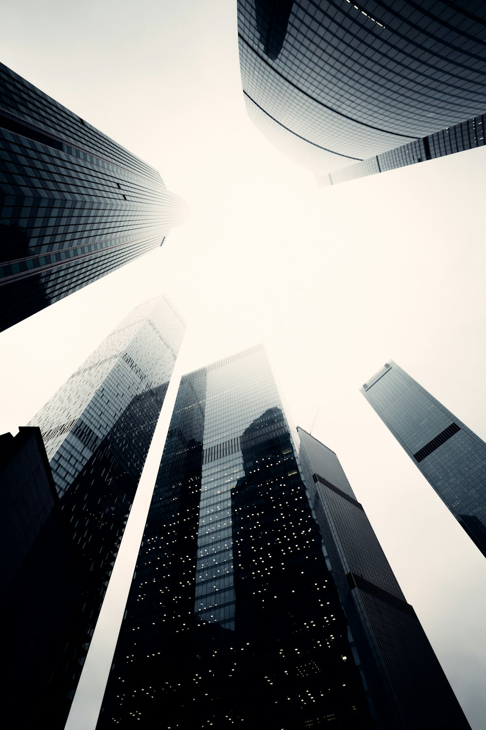 grayscale photo of high rise buildings