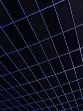 Dark charcoal panel with subtle steel blue grid overlay symbolizing controlled information architecture.