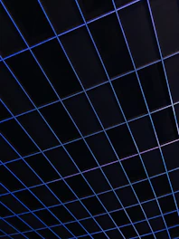 Minimalist digital grid with subtle deep blue accents representing structured social media planning.