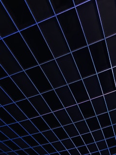 Subtle industrial pattern with navy blue and white lines evoking strength and reliability.