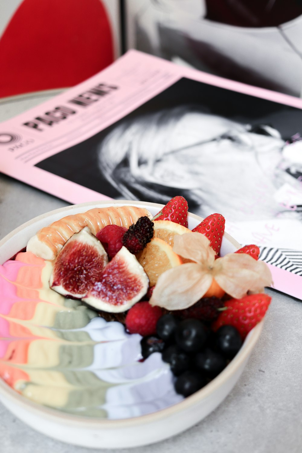 sliced strawberry and blackberry on white ceramic plate