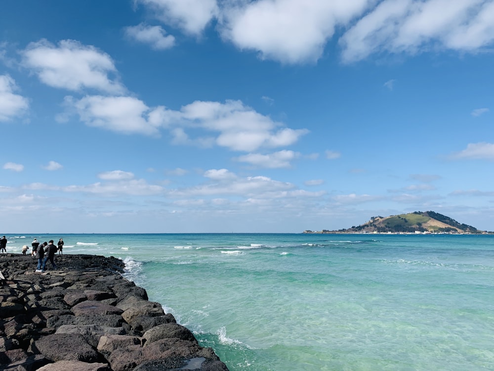 blue sea under blue sky during daytime