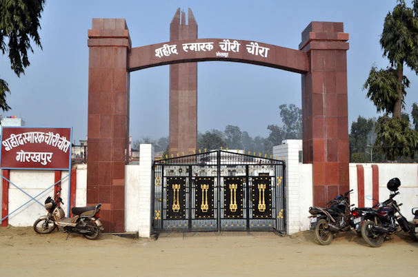 The Ashok Stambh emblem prominently displayed at the entrance of an official exam center.