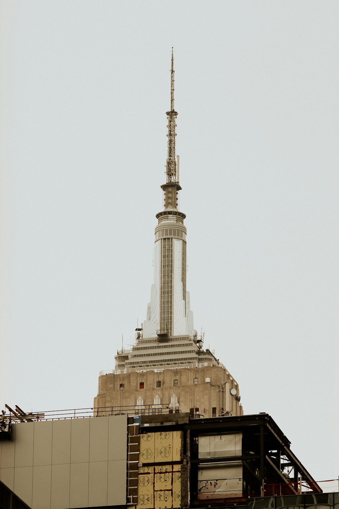 white concrete tower under white sky during daytime