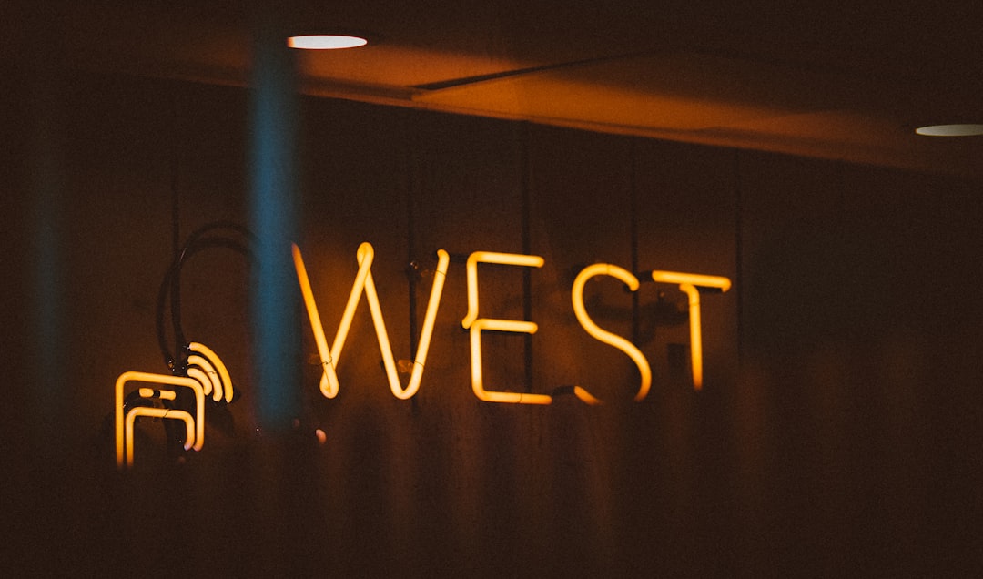 blue and white love neon light signage