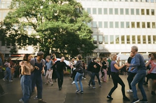 people standing on gray concrete floor during daytime