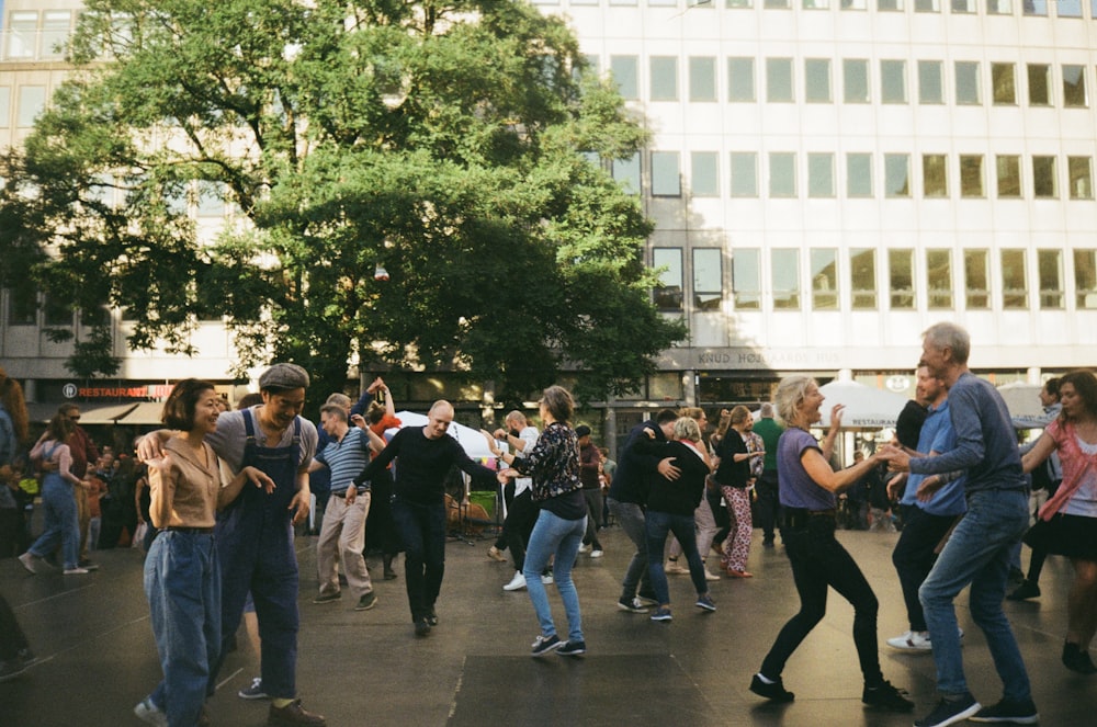 people standing on gray concrete floor during daytime