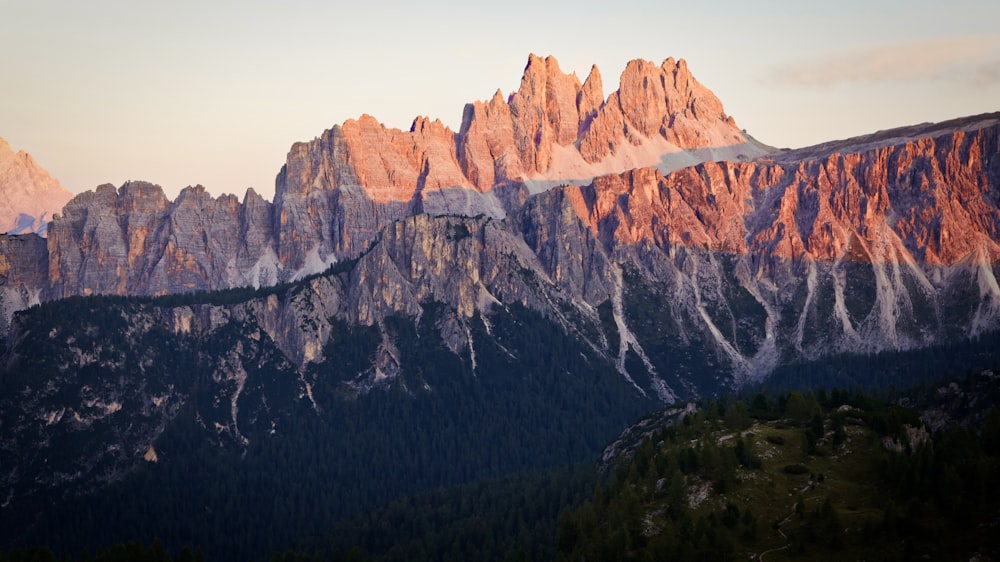 brown rocky mountain under blue sky during daytime