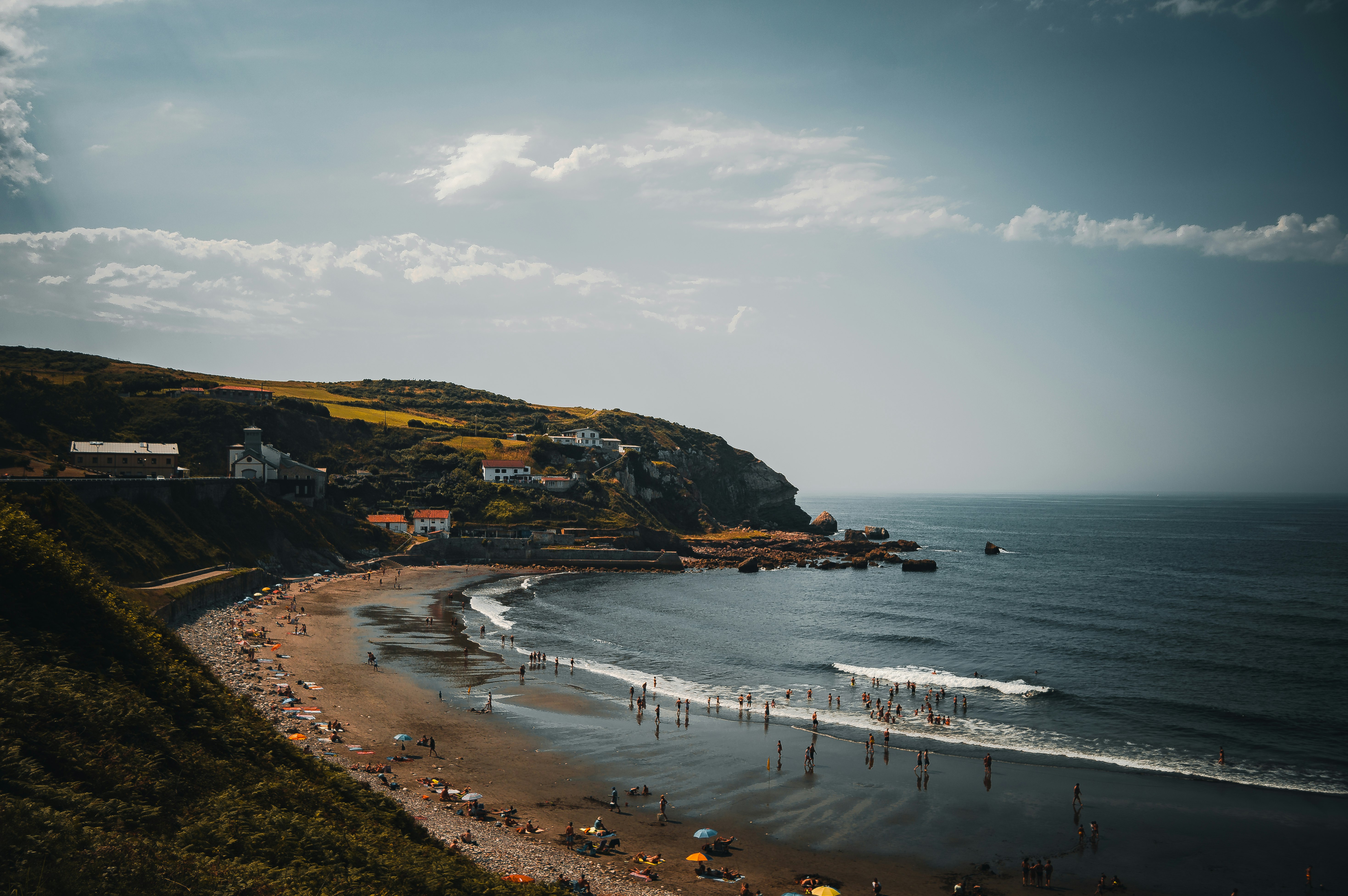 people on beach during daytime