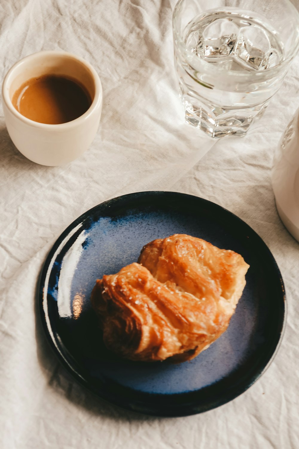 bread on blue ceramic plate