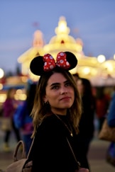 woman in black and red minnie mouse hat